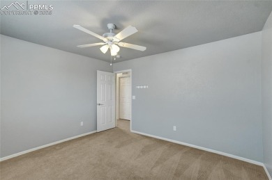 Welcoming home in a golf course community, situated on almost a on Antler Creek Golf Course in Colorado - for sale on GolfHomes.com, golf home, golf lot
