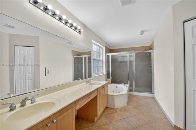 Spacious 5BR, 2.5BA home in Madison Green, Royal Palm Beach on The Links At Madison Green in Florida - for sale on GolfHomes.com, golf home, golf lot