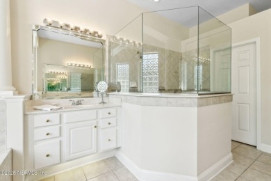 Stunning Amelia National home on a premier lot tucked into a on Amelia National Golf and Country Club in Florida - for sale on GolfHomes.com, golf home, golf lot