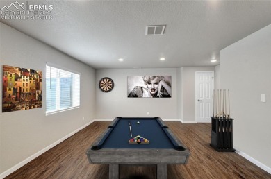 Welcoming home in a golf course community, situated on almost a on Antler Creek Golf Course in Colorado - for sale on GolfHomes.com, golf home, golf lot