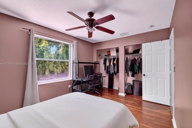 Spacious 5BR, 2.5BA home in Madison Green, Royal Palm Beach on The Links At Madison Green in Florida - for sale on GolfHomes.com, golf home, golf lot