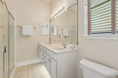 Stunning Amelia National home on a premier lot tucked into a on Amelia National Golf and Country Club in Florida - for sale on GolfHomes.com, golf home, golf lot