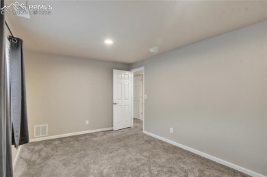 Welcoming home in a golf course community, situated on almost a on Antler Creek Golf Course in Colorado - for sale on GolfHomes.com, golf home, golf lot