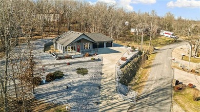 Be the envy of the neighborhood with this stunning custom-built on Bella Vista Country Club - Scottsdale in Arkansas - for sale on GolfHomes.com, golf home, golf lot