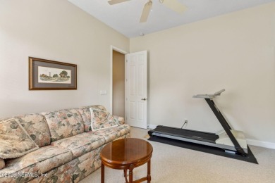 Stunning Amelia National home on a premier lot tucked into a on Amelia National Golf and Country Club in Florida - for sale on GolfHomes.com, golf home, golf lot