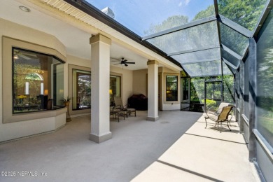 Stunning Amelia National home on a premier lot tucked into a on Amelia National Golf and Country Club in Florida - for sale on GolfHomes.com, golf home, golf lot