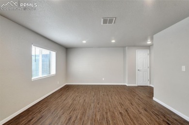 Welcoming home in a golf course community, situated on almost a on Antler Creek Golf Course in Colorado - for sale on GolfHomes.com, golf home, golf lot