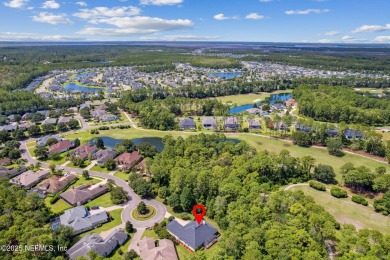 Stunning Amelia National home on a premier lot tucked into a on Amelia National Golf and Country Club in Florida - for sale on GolfHomes.com, golf home, golf lot
