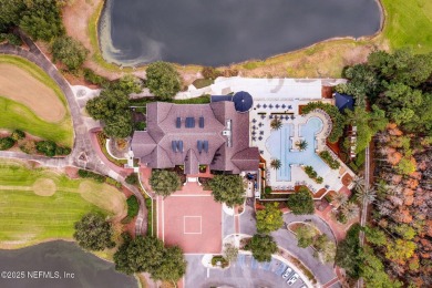 Stunning Amelia National home on a premier lot tucked into a on Amelia National Golf and Country Club in Florida - for sale on GolfHomes.com, golf home, golf lot