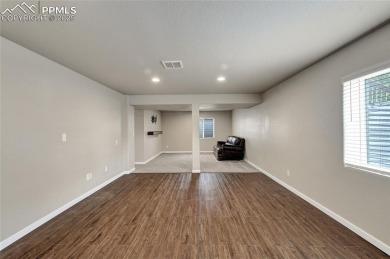 Welcoming home in a golf course community, situated on almost a on Antler Creek Golf Course in Colorado - for sale on GolfHomes.com, golf home, golf lot
