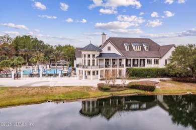 Stunning Amelia National home on a premier lot tucked into a on Amelia National Golf and Country Club in Florida - for sale on GolfHomes.com, golf home, golf lot