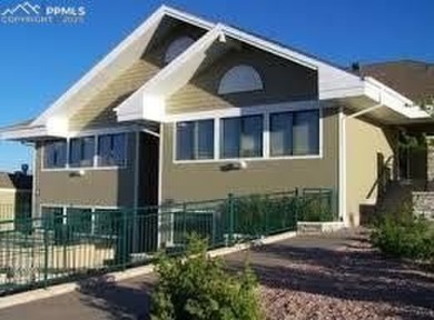 Welcoming home in a golf course community, situated on almost a on Antler Creek Golf Course in Colorado - for sale on GolfHomes.com, golf home, golf lot