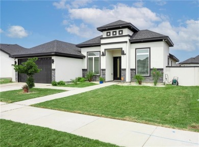 Discover upscale living in this stunning 2021-built stucco home on Los Lagos Golf Club in Texas - for sale on GolfHomes.com, golf home, golf lot