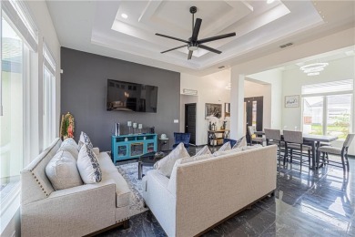 Discover upscale living in this stunning 2021-built stucco home on Los Lagos Golf Club in Texas - for sale on GolfHomes.com, golf home, golf lot