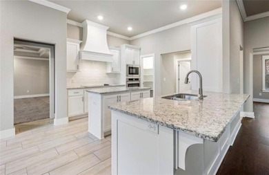 Stunning 2024-built home on a corner lot in Bentonville School on Bella Vista Country Club - Kingswood in Arkansas - for sale on GolfHomes.com, golf home, golf lot