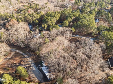 ATTRACTIVE BUILDING LOT AVAILABLE AT BEAUTIFUL LAKE ROYALE!! on River Golf and Country Club at Lake Royale in North Carolina - for sale on GolfHomes.com, golf home, golf lot