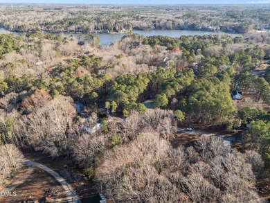 ATTRACTIVE BUILDING LOT AVAILABLE AT BEAUTIFUL LAKE ROYALE!! on River Golf and Country Club at Lake Royale in North Carolina - for sale on GolfHomes.com, golf home, golf lot