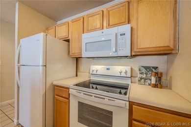 Affordable, move-in-ready walk-in level condo located in Osage on Osage National Golf Club in Missouri - for sale on GolfHomes.com, golf home, golf lot