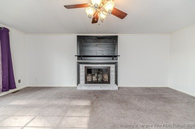 Welcome to 225 Lakeview Drive - a beautifully updated 2-story on Carolina Trace Country Club in North Carolina - for sale on GolfHomes.com, golf home, golf lot