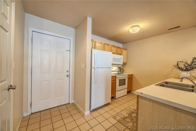 Affordable, move-in-ready walk-in level condo located in Osage on Osage National Golf Club in Missouri - for sale on GolfHomes.com, golf home, golf lot