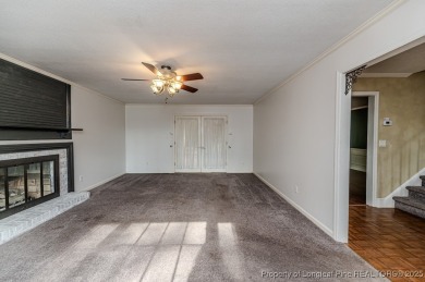 Welcome to 225 Lakeview Drive - a beautifully updated 2-story on Carolina Trace Country Club in North Carolina - for sale on GolfHomes.com, golf home, golf lot