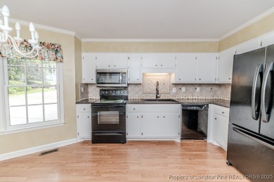 Welcome to 225 Lakeview Drive - a beautifully updated 2-story on Carolina Trace Country Club in North Carolina - for sale on GolfHomes.com, golf home, golf lot