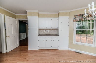 Welcome to 225 Lakeview Drive - a beautifully updated 2-story on Carolina Trace Country Club in North Carolina - for sale on GolfHomes.com, golf home, golf lot