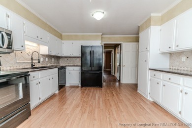 Welcome to 225 Lakeview Drive - a beautifully updated 2-story on Carolina Trace Country Club in North Carolina - for sale on GolfHomes.com, golf home, golf lot