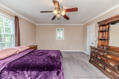 Welcome to 225 Lakeview Drive - a beautifully updated 2-story on Carolina Trace Country Club in North Carolina - for sale on GolfHomes.com, golf home, golf lot