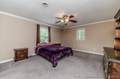 Welcome to 225 Lakeview Drive - a beautifully updated 2-story on Carolina Trace Country Club in North Carolina - for sale on GolfHomes.com, golf home, golf lot
