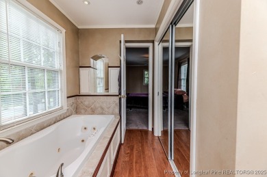 Welcome to 225 Lakeview Drive - a beautifully updated 2-story on Carolina Trace Country Club in North Carolina - for sale on GolfHomes.com, golf home, golf lot