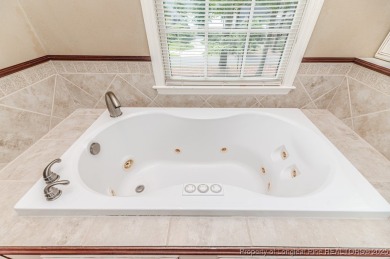 Welcome to 225 Lakeview Drive - a beautifully updated 2-story on Carolina Trace Country Club in North Carolina - for sale on GolfHomes.com, golf home, golf lot