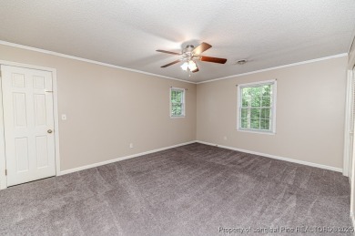 Welcome to 225 Lakeview Drive - a beautifully updated 2-story on Carolina Trace Country Club in North Carolina - for sale on GolfHomes.com, golf home, golf lot