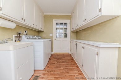 Welcome to 225 Lakeview Drive - a beautifully updated 2-story on Carolina Trace Country Club in North Carolina - for sale on GolfHomes.com, golf home, golf lot