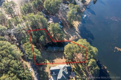 0.46 acre Waterfront Lot with stunning views and a quiet on Woodlake Country Club in North Carolina - for sale on GolfHomes.com, golf home, golf lot
