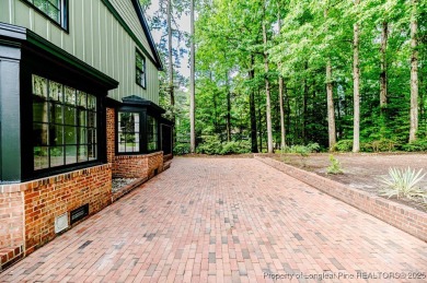 Welcome to 225 Lakeview Drive - a beautifully updated 2-story on Carolina Trace Country Club in North Carolina - for sale on GolfHomes.com, golf home, golf lot