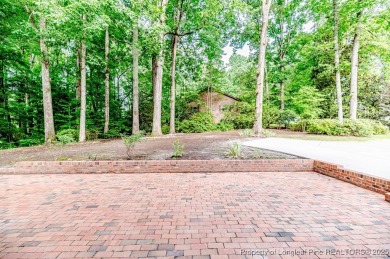 Welcome to 225 Lakeview Drive - a beautifully updated 2-story on Carolina Trace Country Club in North Carolina - for sale on GolfHomes.com, golf home, golf lot