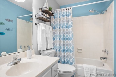 Experience unparalleled lakefront living with this stunning on The Oaks Golf Course in Missouri - for sale on GolfHomes.com, golf home, golf lot