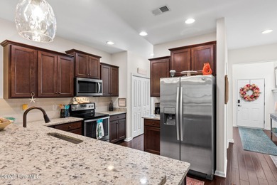 Welcome to this stunning townhouse-style condo, being sold fully on Carolina Shores Golf Course in North Carolina - for sale on GolfHomes.com, golf home, golf lot