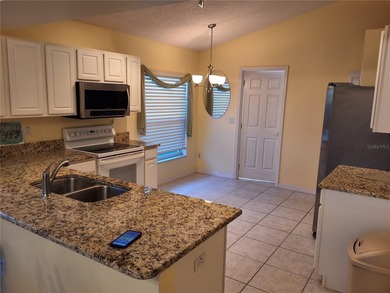 Lovely home in Kings Ridge. New roof in Aug 2020, new HVAC in on Kings Ridge Golf Club in Florida - for sale on GolfHomes.com, golf home, golf lot