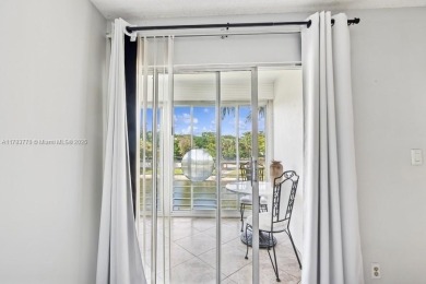 Welcome to this bright and spacious 2-bedroom, 2-bath condo on Wynmoor Golf Course in Florida - for sale on GolfHomes.com, golf home, golf lot