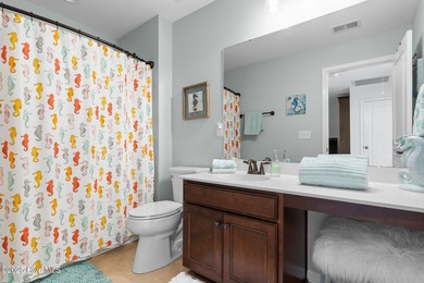 Welcome to this stunning townhouse-style condo, being sold fully on Carolina Shores Golf Course in North Carolina - for sale on GolfHomes.com, golf home, golf lot