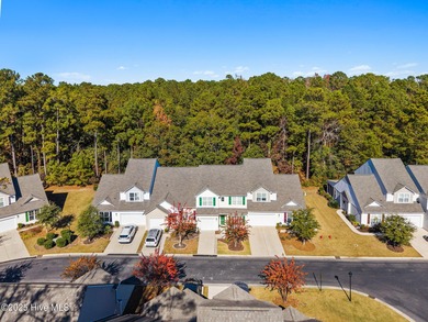 Welcome to this stunning townhouse-style condo, being sold fully on Carolina Shores Golf Course in North Carolina - for sale on GolfHomes.com, golf home, golf lot