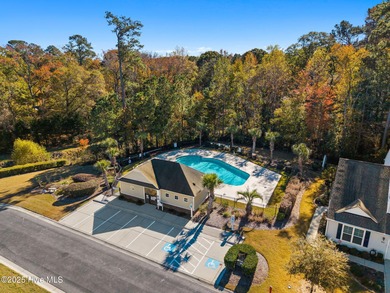 Welcome to this stunning townhouse-style condo, being sold fully on Carolina Shores Golf Course in North Carolina - for sale on GolfHomes.com, golf home, golf lot