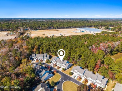 Welcome to this stunning townhouse-style condo, being sold fully on Carolina Shores Golf Course in North Carolina - for sale on GolfHomes.com, golf home, golf lot