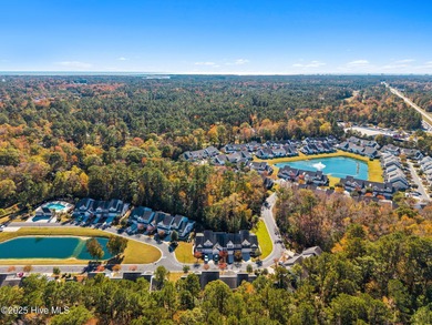 Welcome to this stunning townhouse-style condo, being sold fully on Carolina Shores Golf Course in North Carolina - for sale on GolfHomes.com, golf home, golf lot