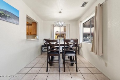 This 2 bed, 2 bath single level townhouse with a  carport is on Canyon Mesa Country Club in Arizona - for sale on GolfHomes.com, golf home, golf lot