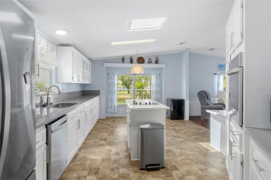 This stunning 3 bedroom 2 bath Palm Harbor home sits on the #11 on Brookridge Country Club in Florida - for sale on GolfHomes.com, golf home, golf lot