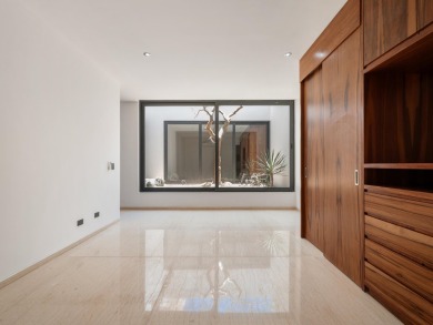 Sophisticated and solidly built, this 5,588 sq.ft. estate in on  in  - for sale on GolfHomes.com, golf home, golf lot