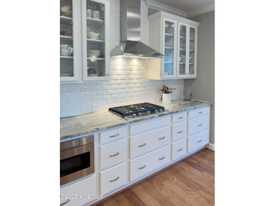 Welcome to this beautifully appointed 4-bed, 3-bath home in The on Members Club At St. James Plantation in North Carolina - for sale on GolfHomes.com, golf home, golf lot